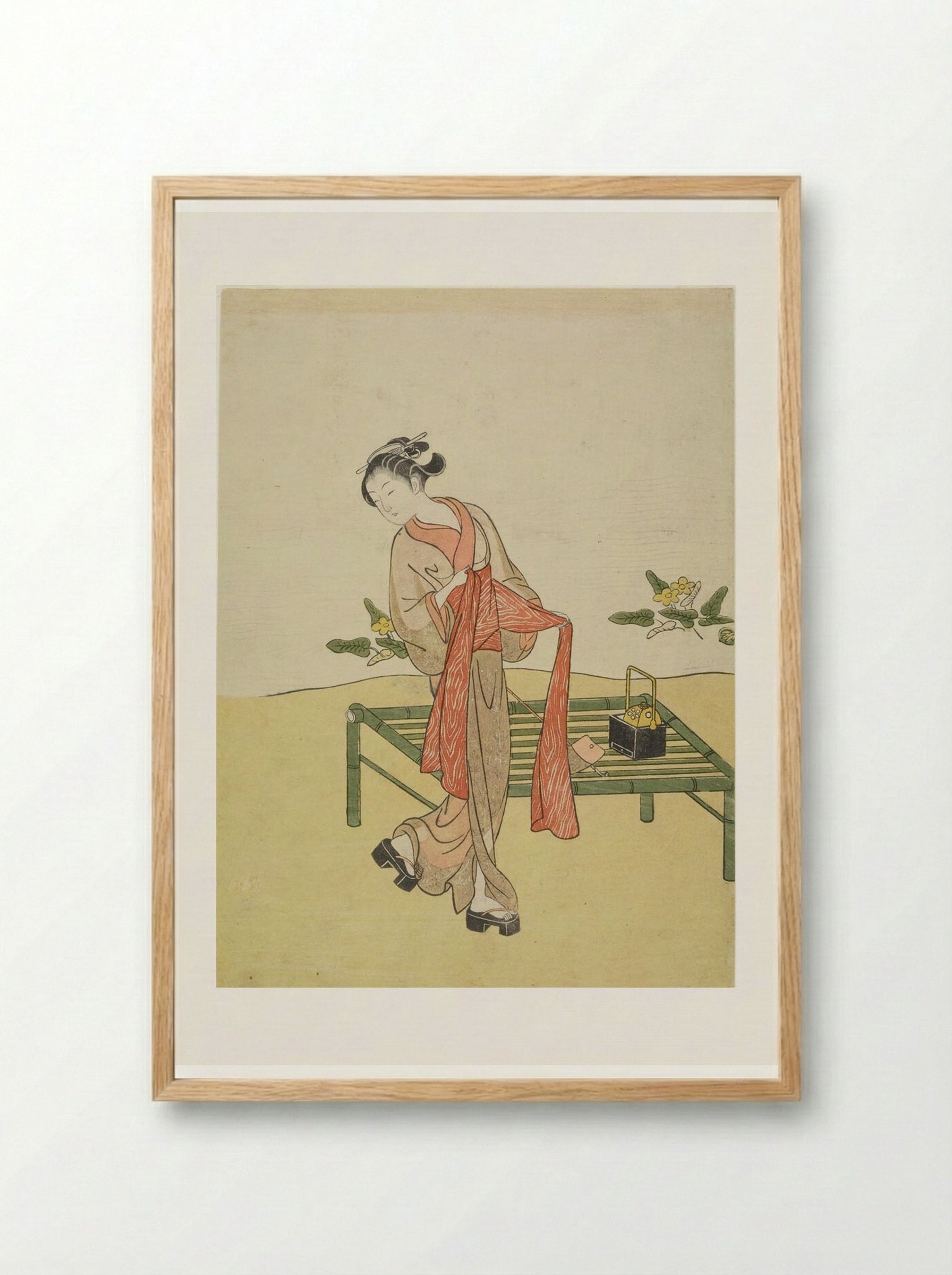Young Woman Tying Obi Beside Bamboo Bench - Suzuki Harunobu - Framed Print Wood