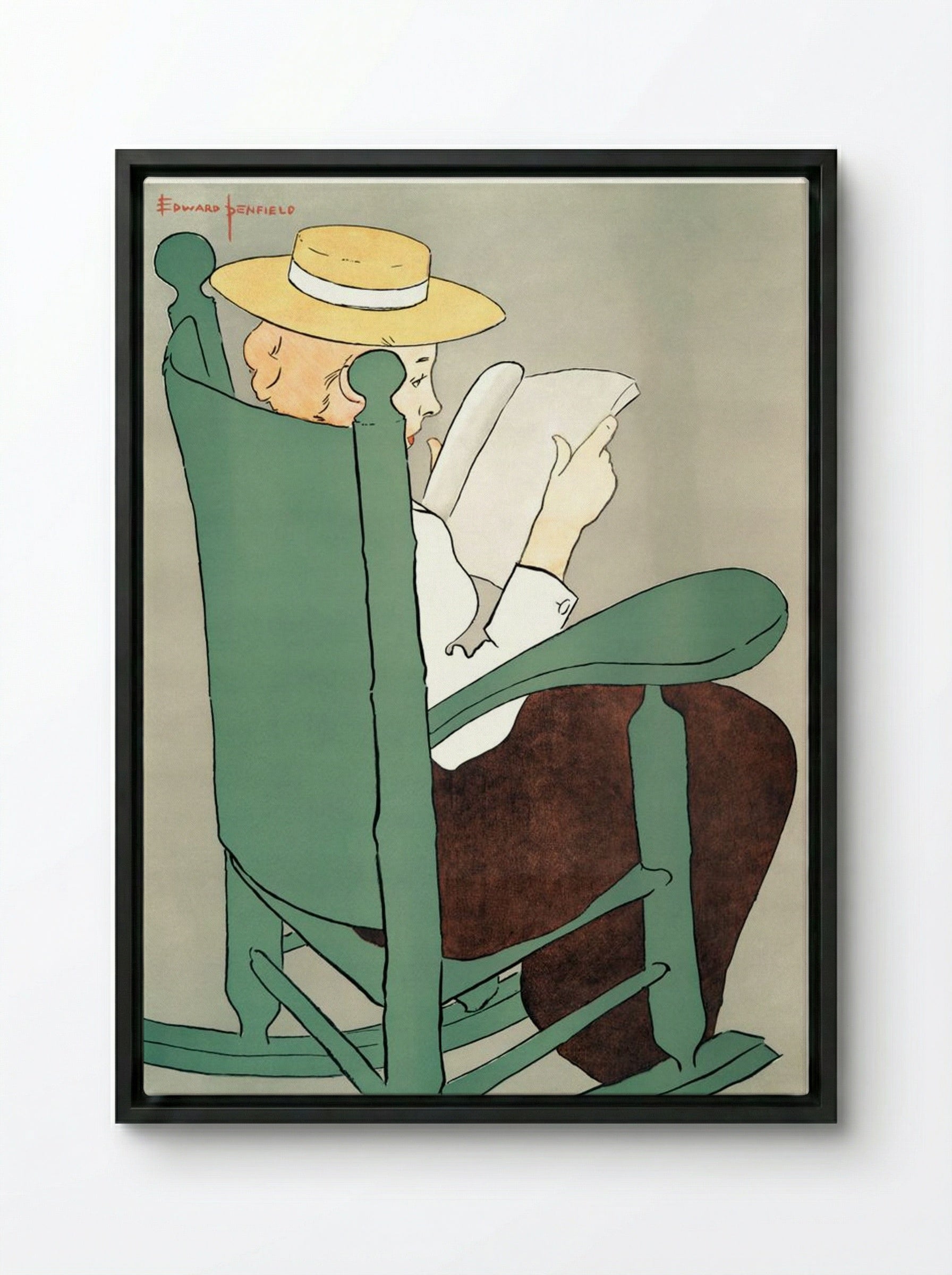 Woman Reading in a Rocking Chair - Edward Penfield - Framed Canvas Black