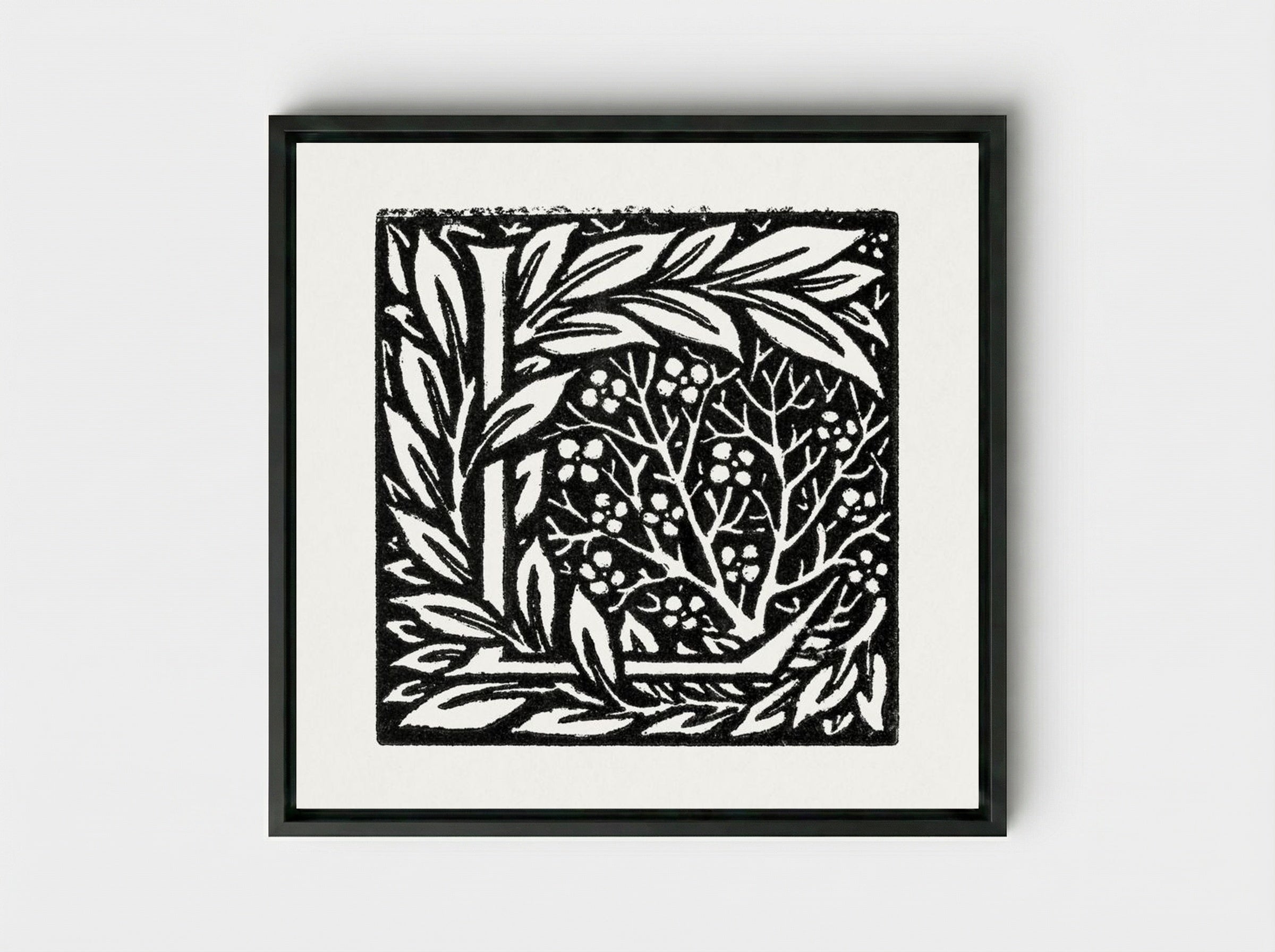 Love is Enough - Initial letter 'L' entwined with Laurel Leaves - William Morris - Framed Canvas Black