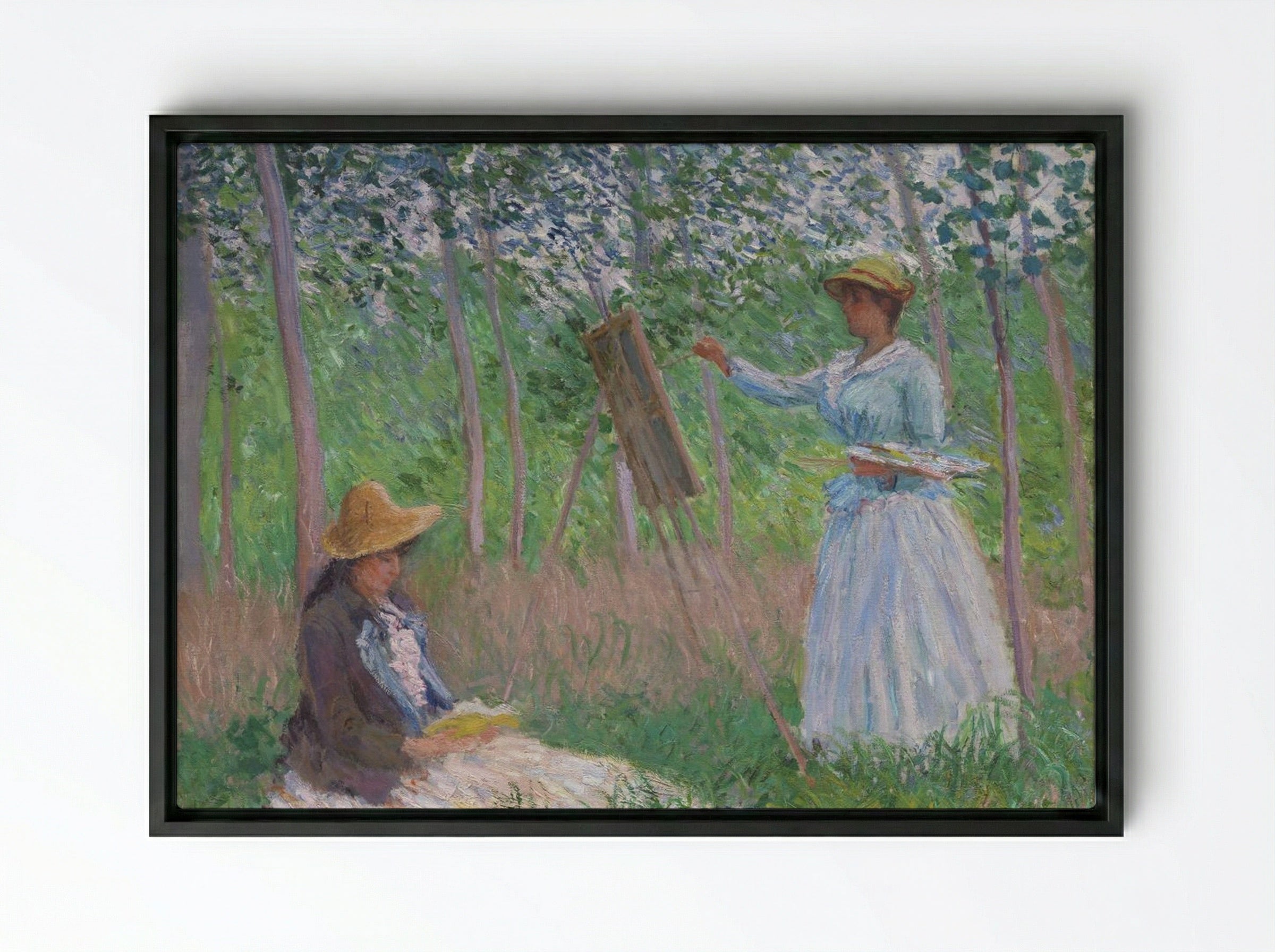 Blanche Hoschedé at Her Easel with Suzanne Hoschedé Reading - Claude Monet - Framed Canvas Black
