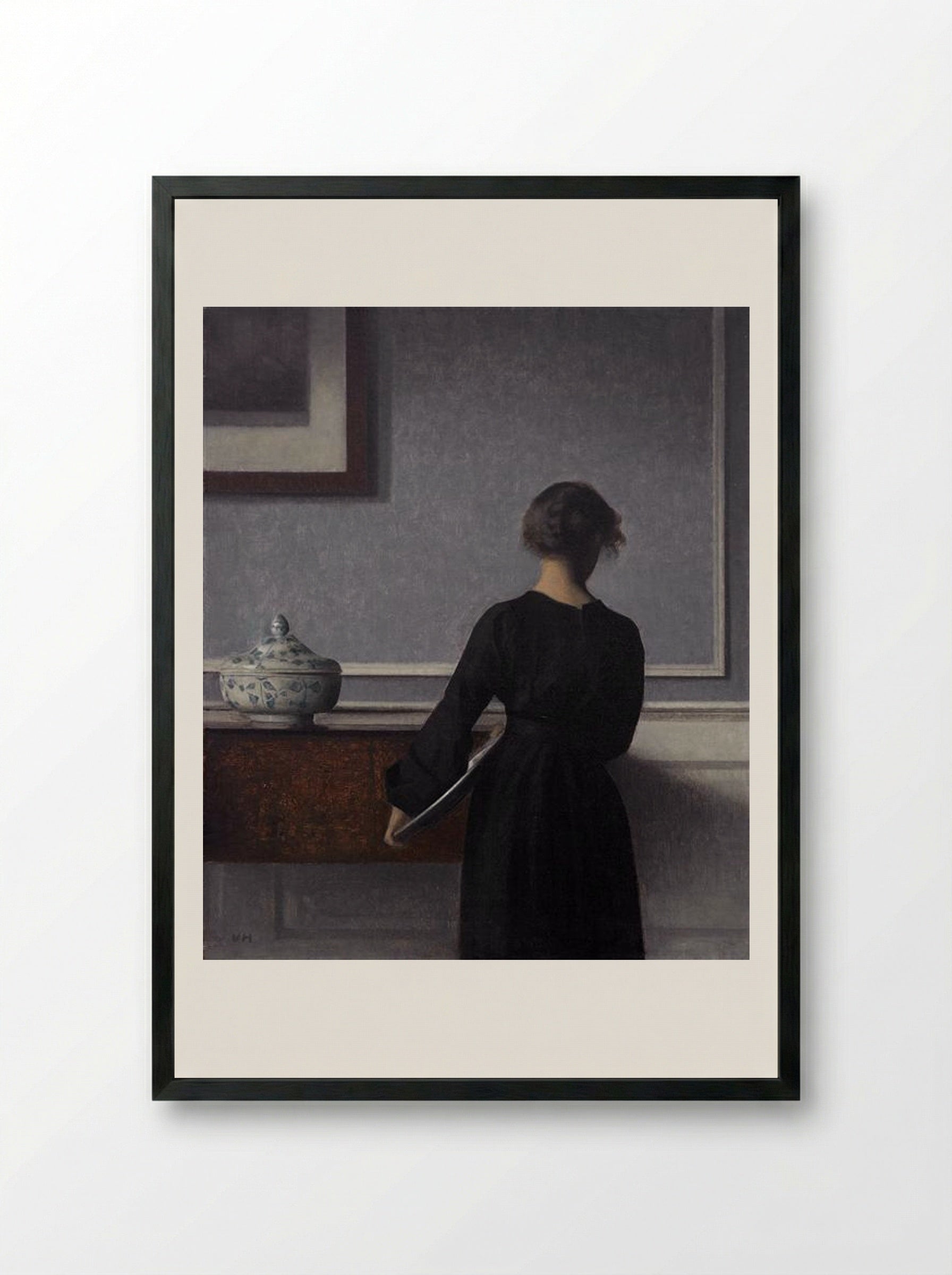 Interior with Young Woman from Behind - Vilhelm Hammershøi - Framed Print Black
