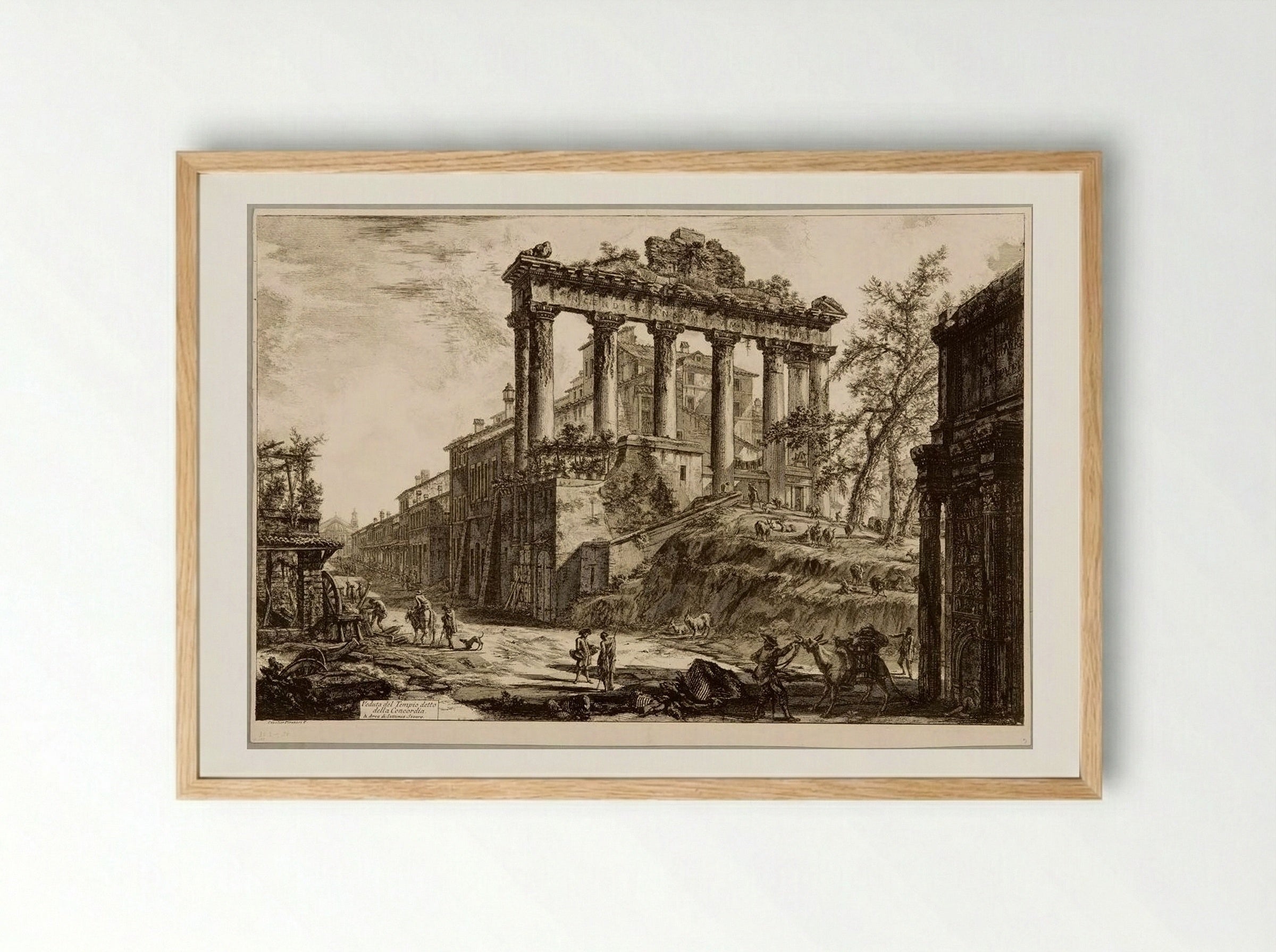 The Temple of Saturn, with a Corner of the Arch of Septimius Severus in the Background - Giovanni Battista Piranesi - Framed Print Wood