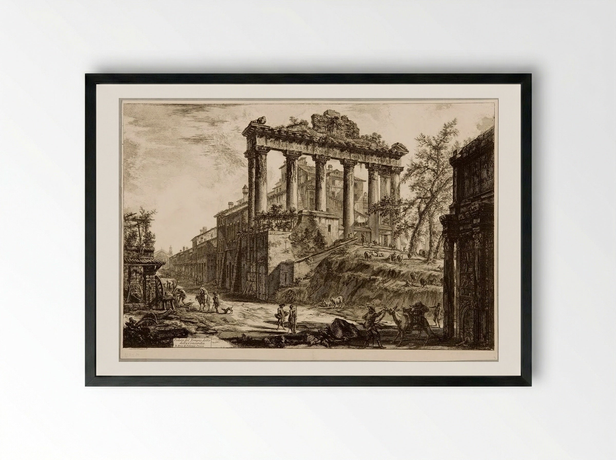 The Temple of Saturn, with a Corner of the Arch of Septimius Severus in the Background - Giovanni Battista Piranesi - Framed Print Black