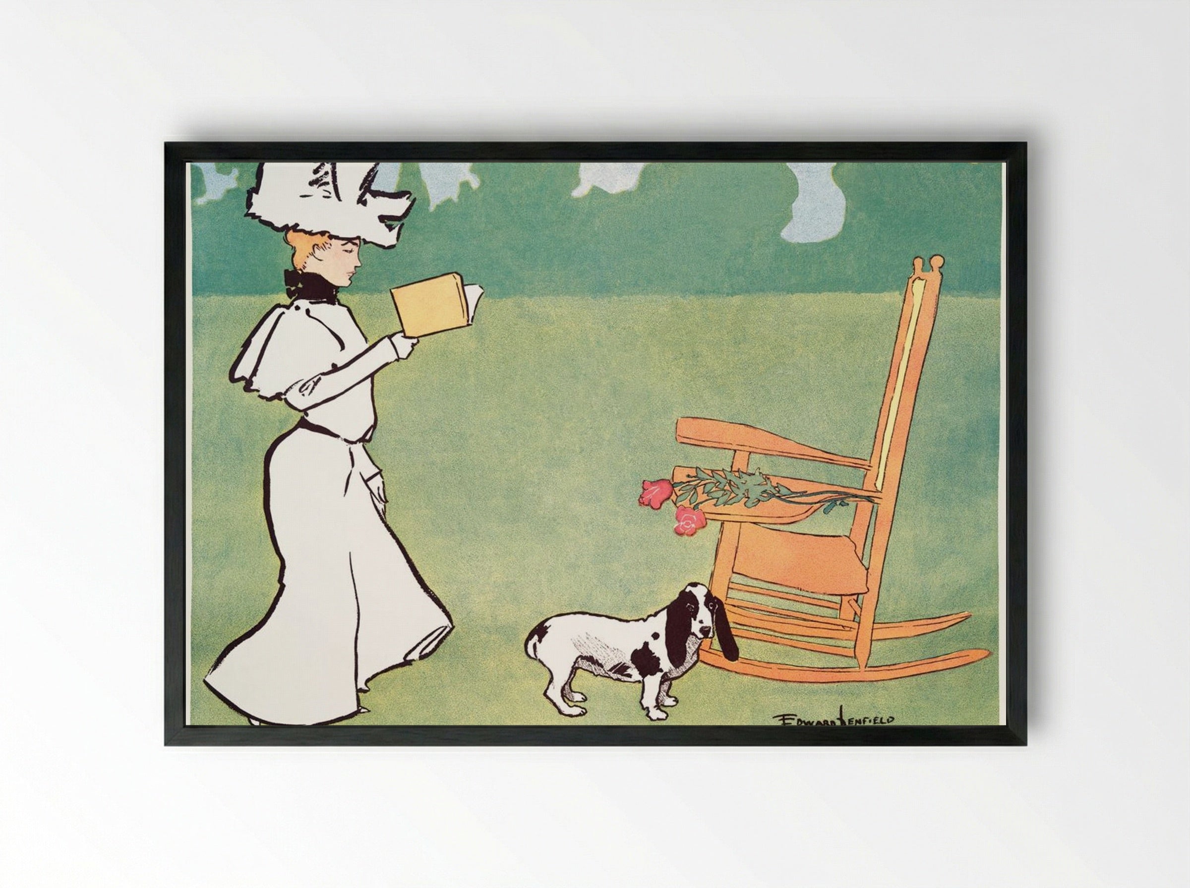 Woman Reading in the Garden - Edward Penfield - Framed Print Black