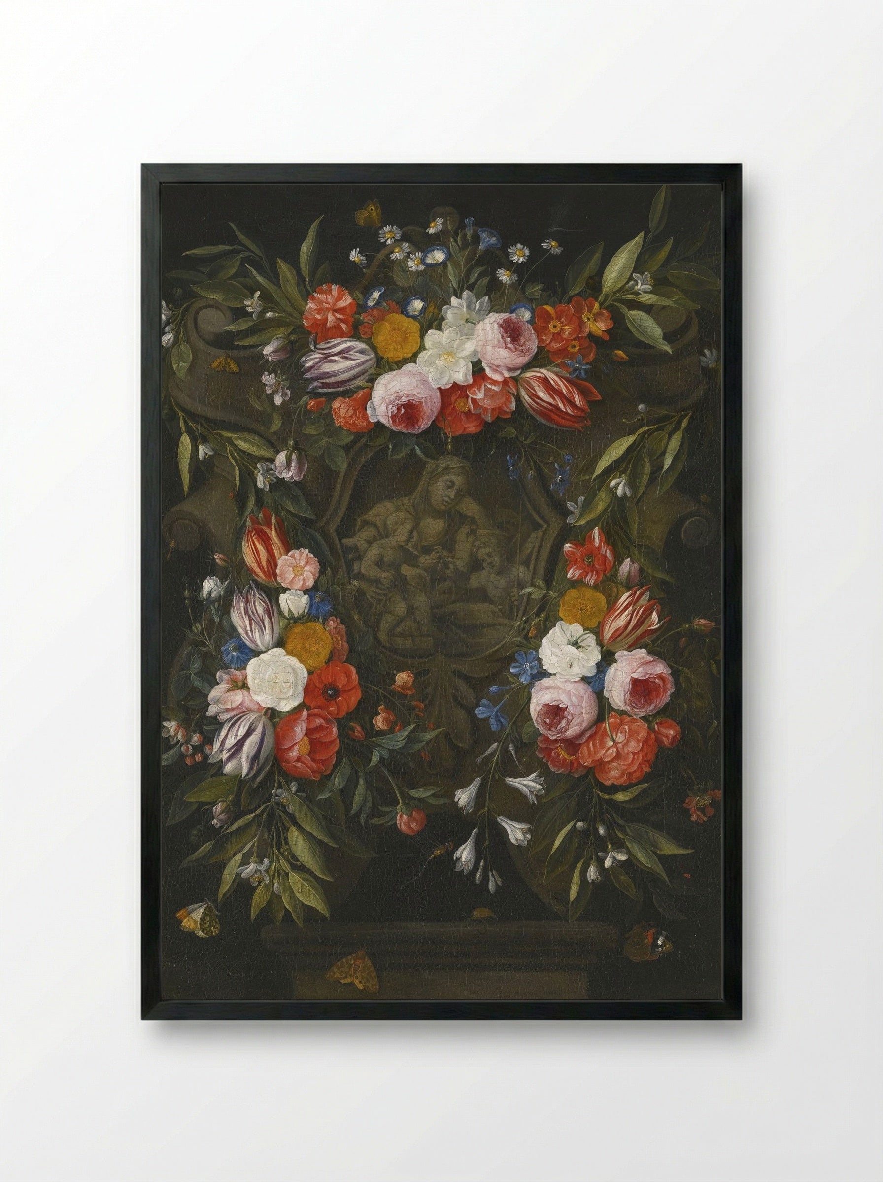 A Garland of Flowers Around a Stone Cartouche Depicting the Virgin and Child and Saint John - Jan van Kessel the Elder - Framed Print Black