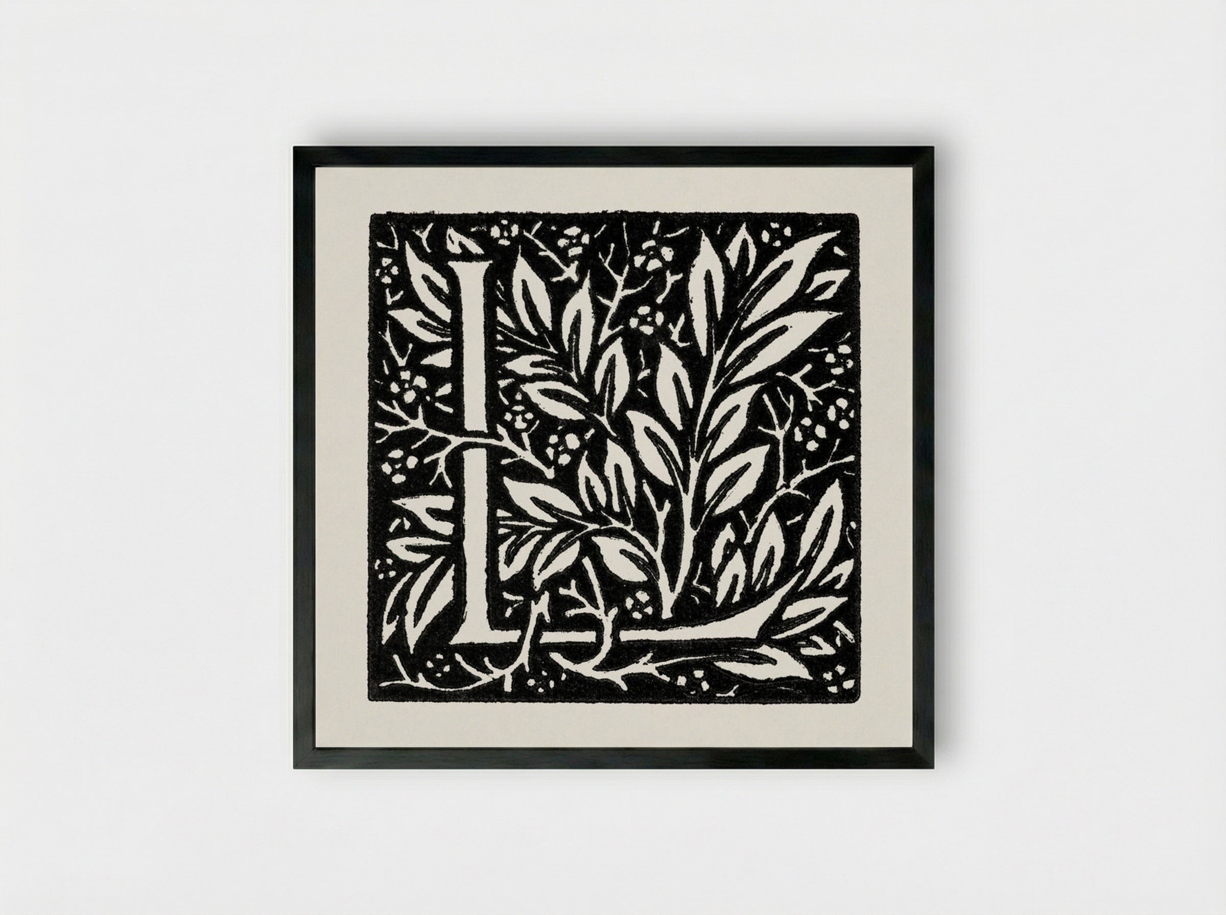 Love is Enough: Initial Letter 'L' entwined with Laurel Leaves - William Morris - Framed Print Black