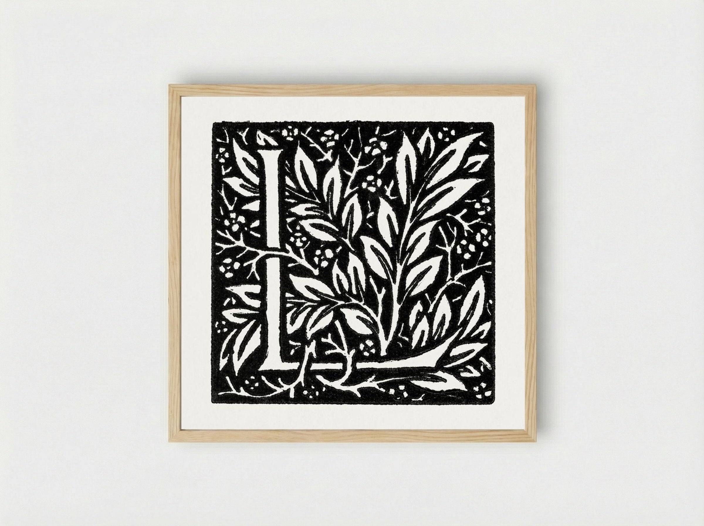 Love is Enough: Initial Letter 'L' entwined with Laurel Leaves - William Morris - Framed Print Wood