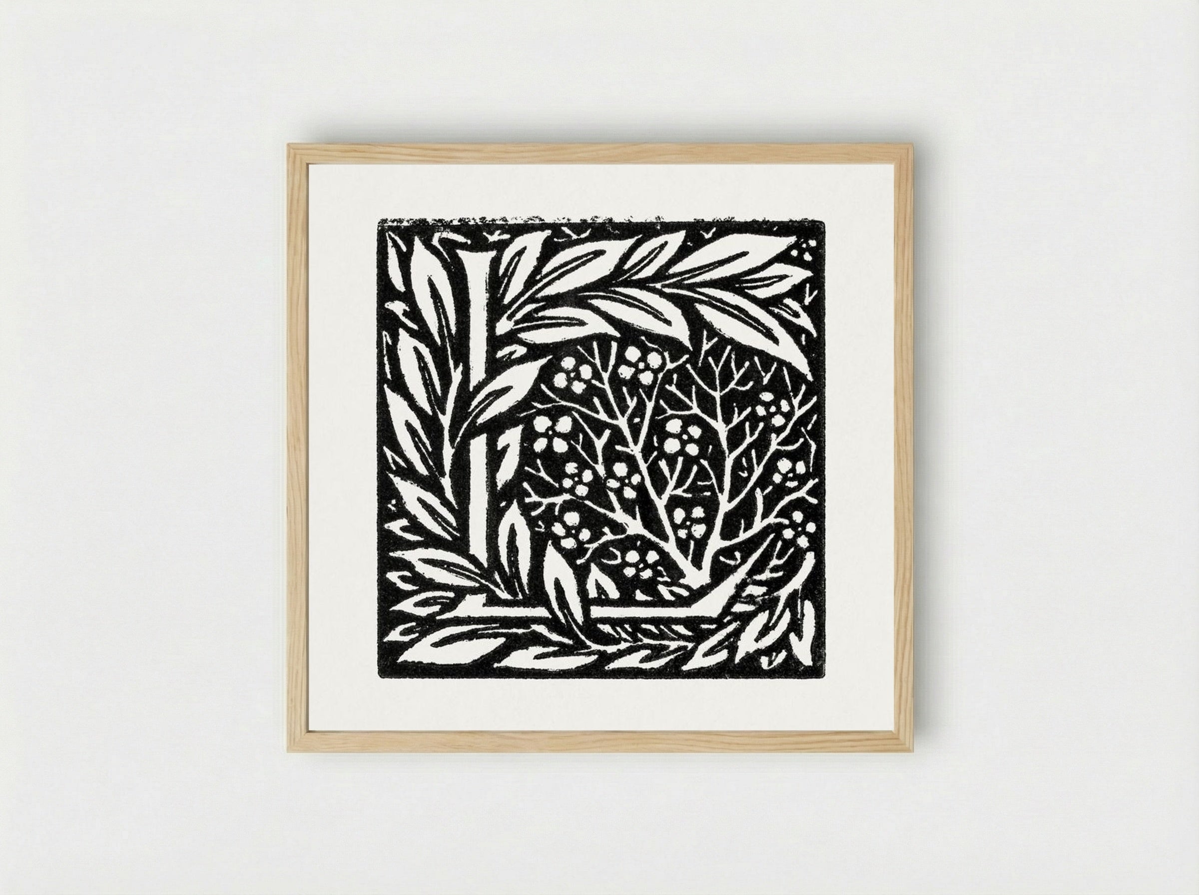 Love is Enough - Initial letter 'L' entwined with Laurel Leaves - William Morris - Framed Print Wood