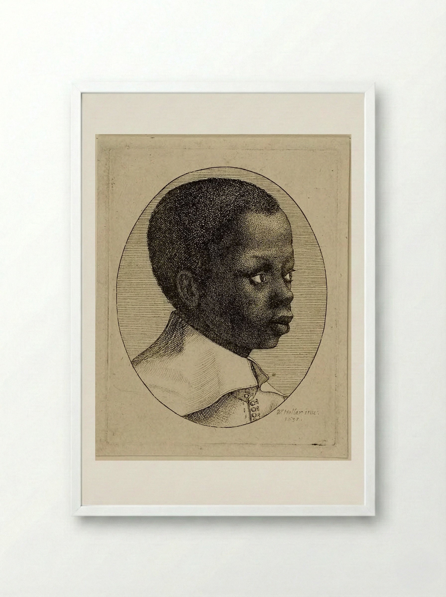 Head of a Young Black Boy in Profile to Right in an Oval - Wenceslaus Hollar - Framed Print White