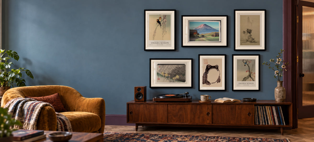 Listening room with six framed Japanese prints by Ohara Koson, Hasui, Sesshu, Hiroshige and Matsumoto Hoji above a walnut record cabinet