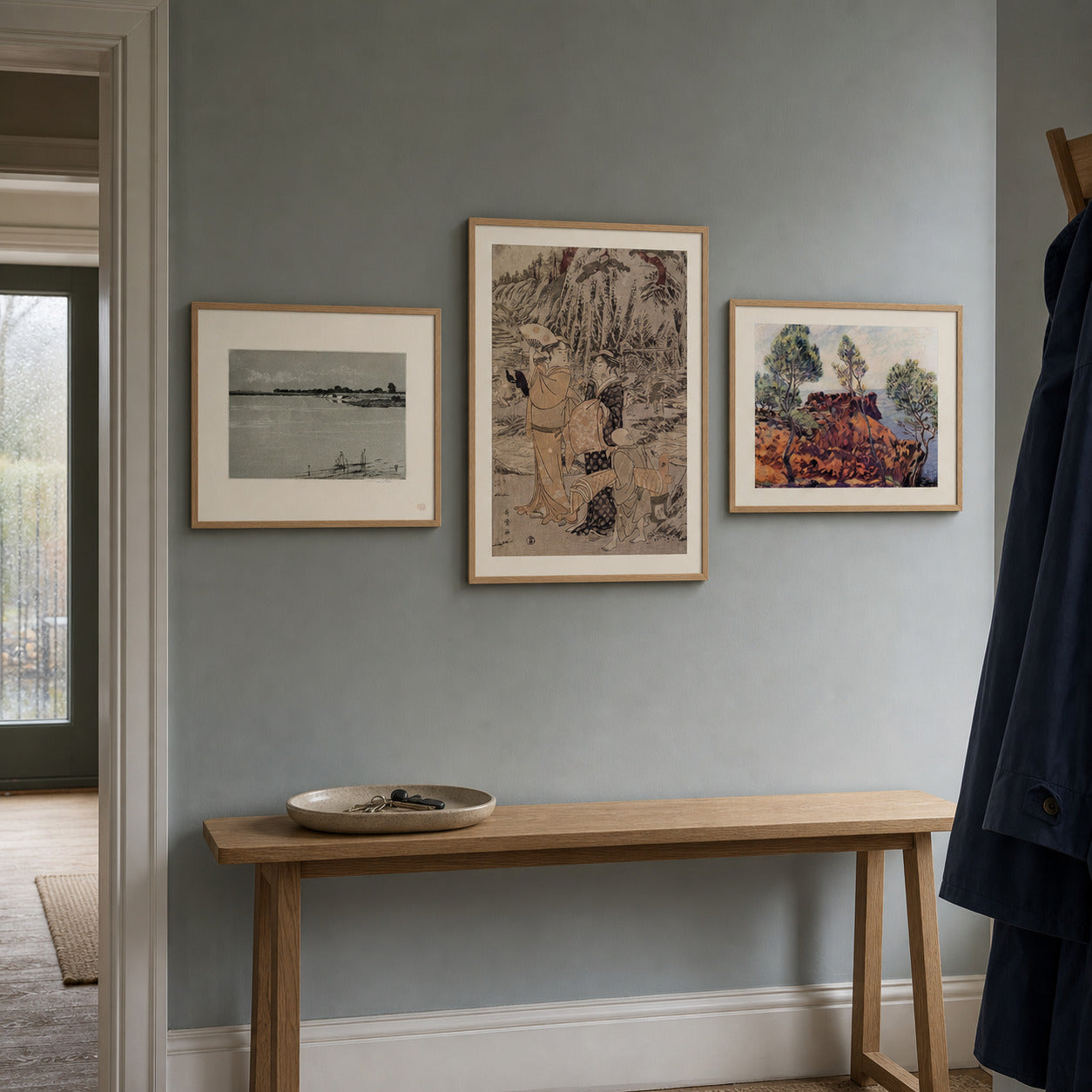 Three Coasts curated gallery wall in a lived-in room